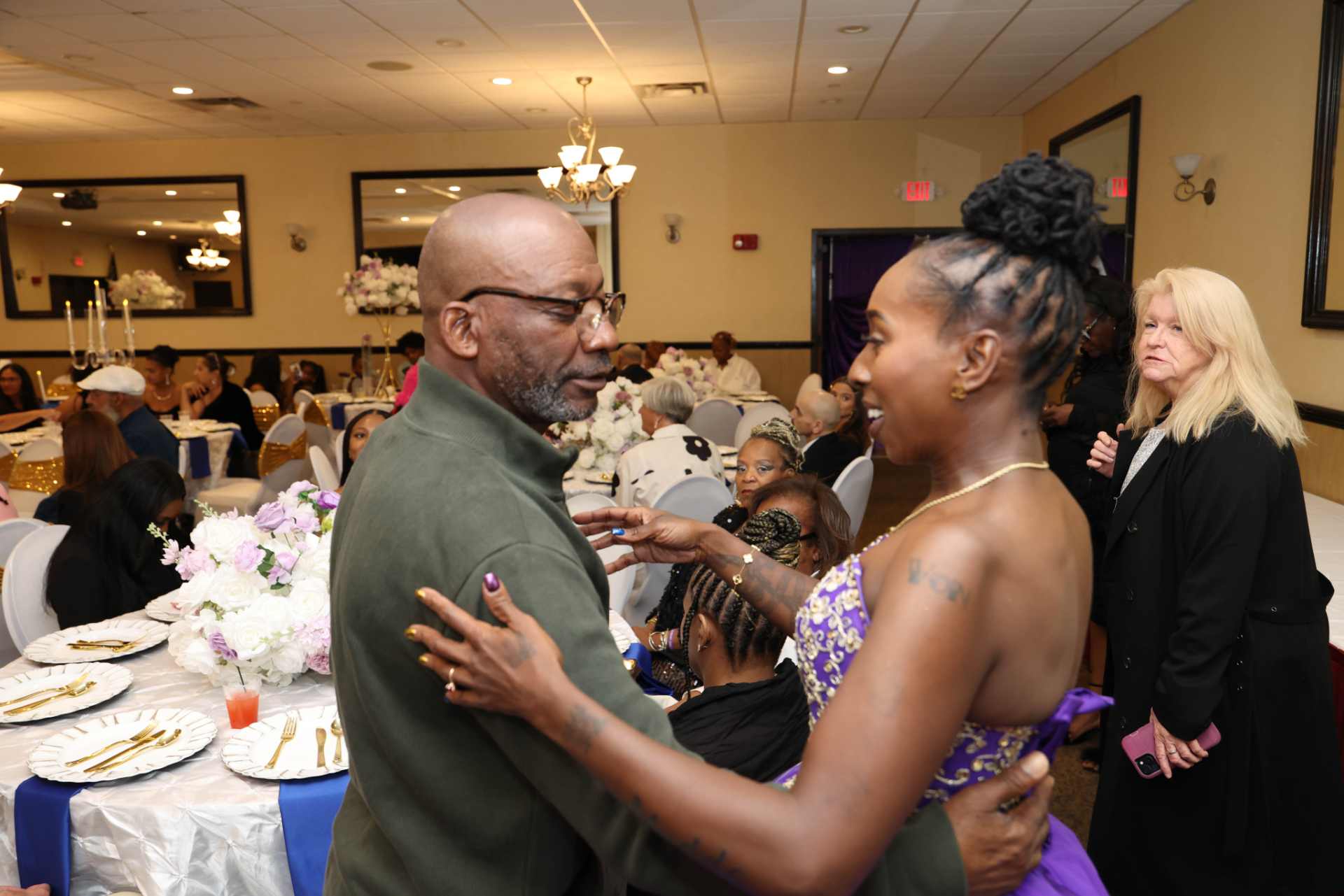 2025 candid moment at Winnin Against Addiction gala dinner celebrating community