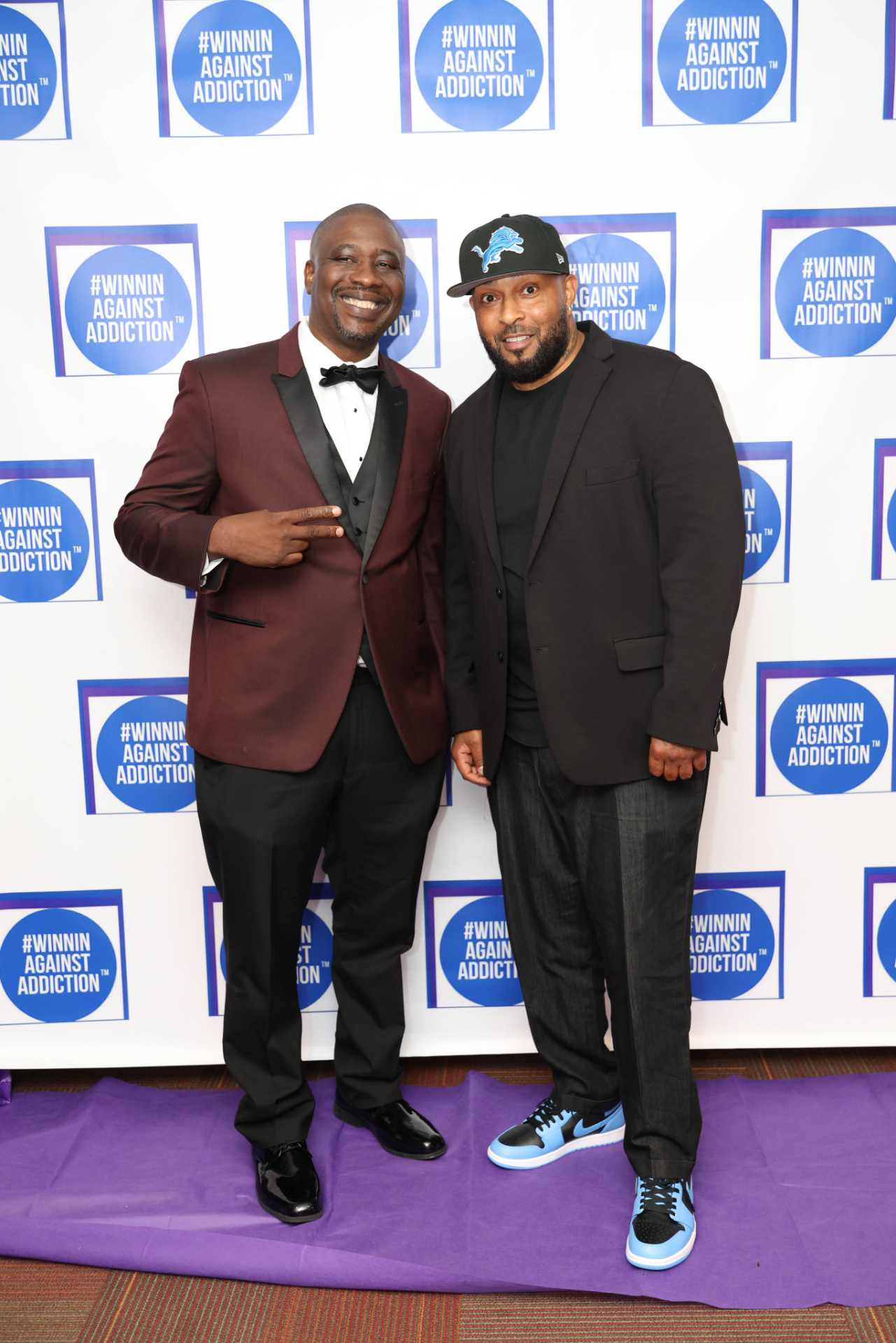 2025 annual gala attendees on purple carpet at Winnin Against Addiction celebration